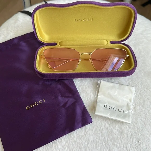 Gucci Sunglasses with Gold Frame and Purple Case http:// main image 4